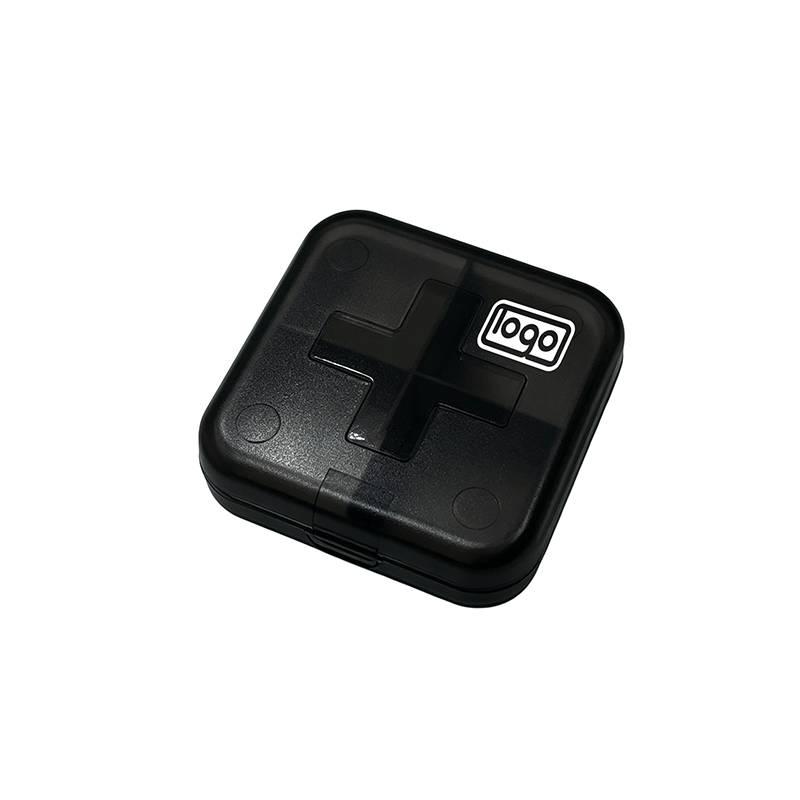 Cross-shaped 4-compartment pill box