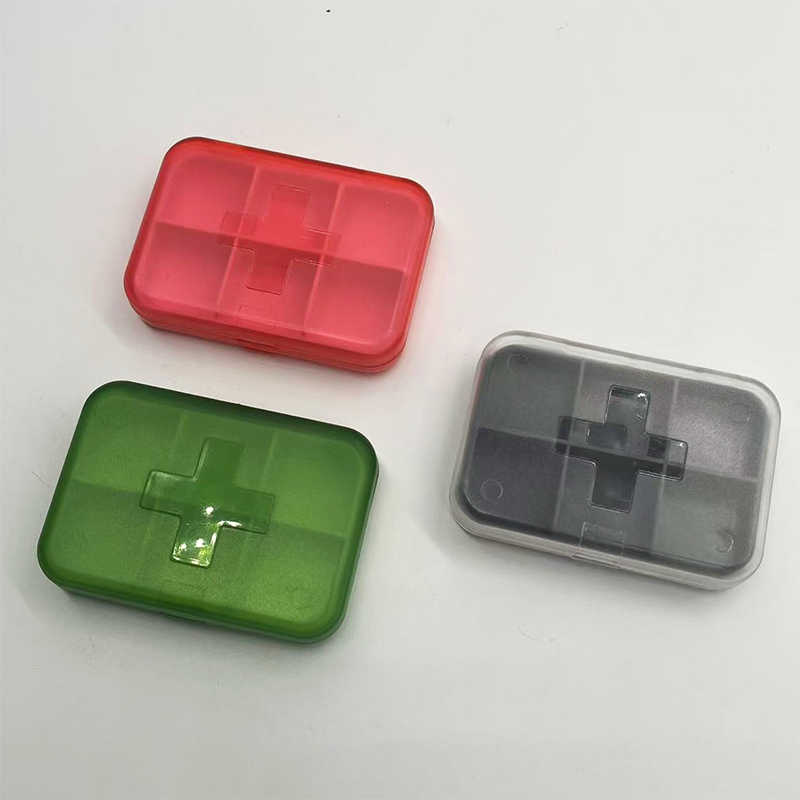 Cross-shaped 6-compartment pill box